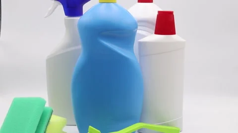 Different products and items for cleaning on the floor in the kitchen. Stock-Footage 167630641