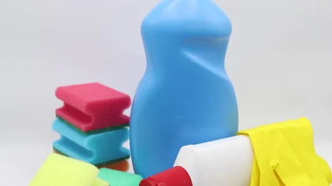 Different products and items for cleaning on the floor in the kitchen. Stock-Footage 167631067