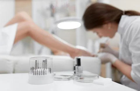 Different professional cosmetics and tools for french pedicure. Stock Photos