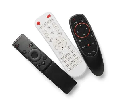 Different remote controllers on white background 库存照片