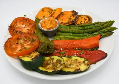 Different roasted vegetables in a Mediterranean restaurant Stock Photos