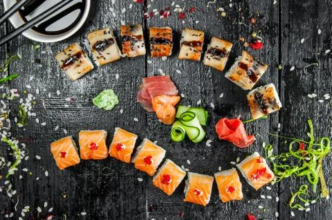 Different rolls on a dark background Stock Photos