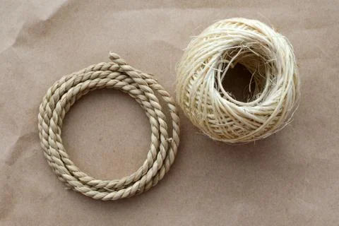 Different ropes over paper background Stock Photos