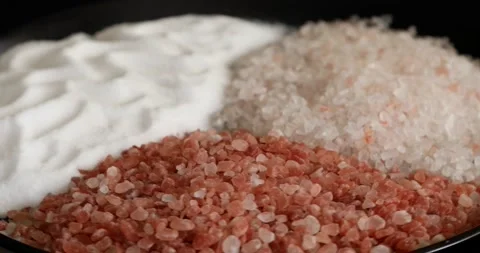 Different salt types rotating on black background 2 스톡 동영상 140926204