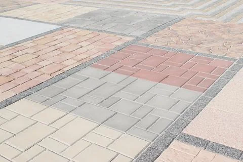 Different  samples of exterior pavement tiles in the warehouse. Shop with bui Stock Photos
