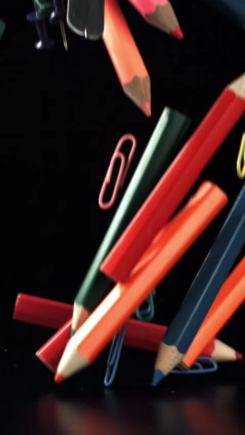 Different school objects fly and fall against the background of the blackboard Stock Footage 335369334