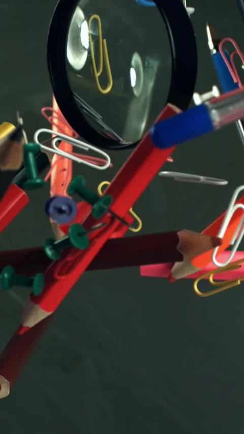 Different school objects fly and fall against the background of the blackboard Stock Footage 335370226