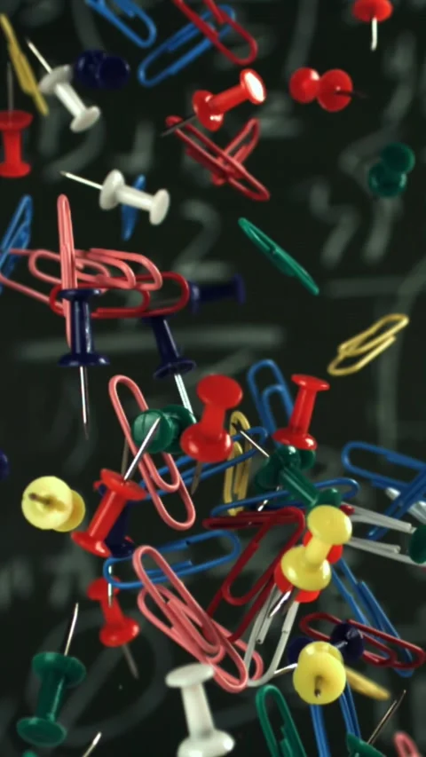 Different school objects fly and fall against the background of the blackboard Stock Footage 335371447