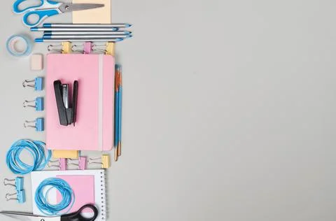 Different school supplies on light grey background Stock Photos