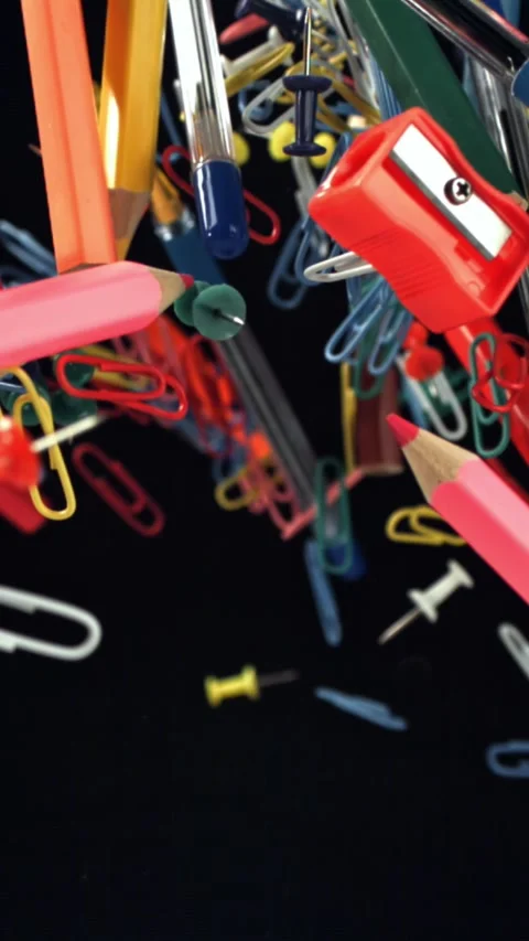 Different school tools fly up and down. Back to school. Filmed on a high-speed Stock Footage 335367275