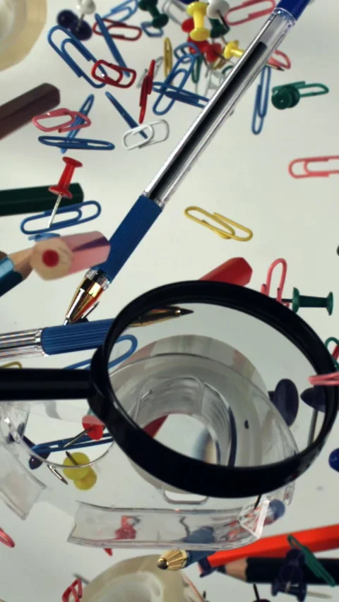 Different school tools fly up and down. Back to school. Filmed on a high-speed Stock Footage 335378578