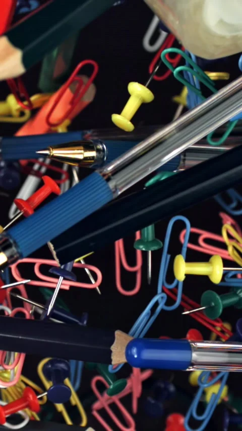 Different school tools fly up and down. Back to school. Filmed on a high-speed Stock Footage 335379842