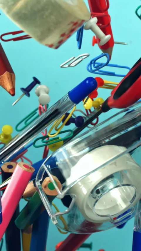Different school tools fly up and down. Back to school. Filmed on a high-speed Stock Footage 335380103