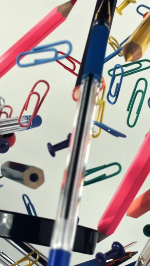 Different school tools fly up and down. Back to school. Filmed on a high-speed Stock Footage 335381682