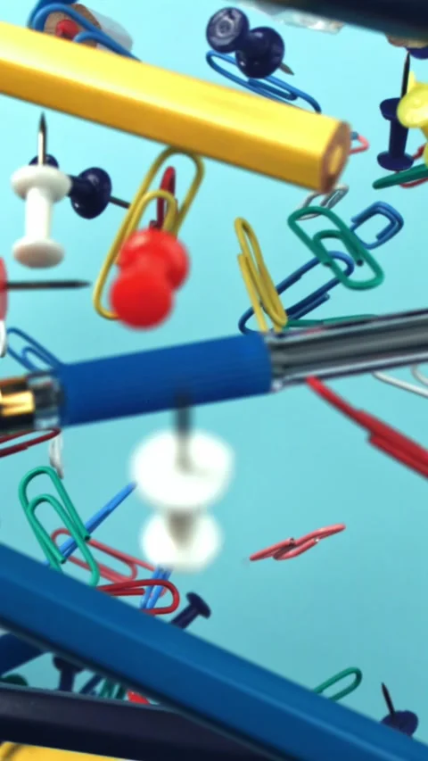 Different school tools fly up and down. Back to school. Filmed on a high-speed Stock Footage 335381790