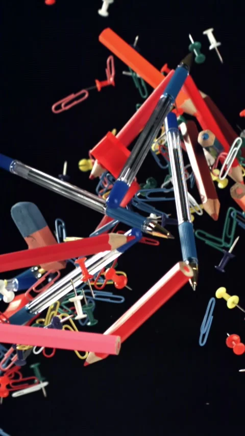 Different school tools fly up and down. Back to school. Filmed on a high-speed Stock Footage 335381857