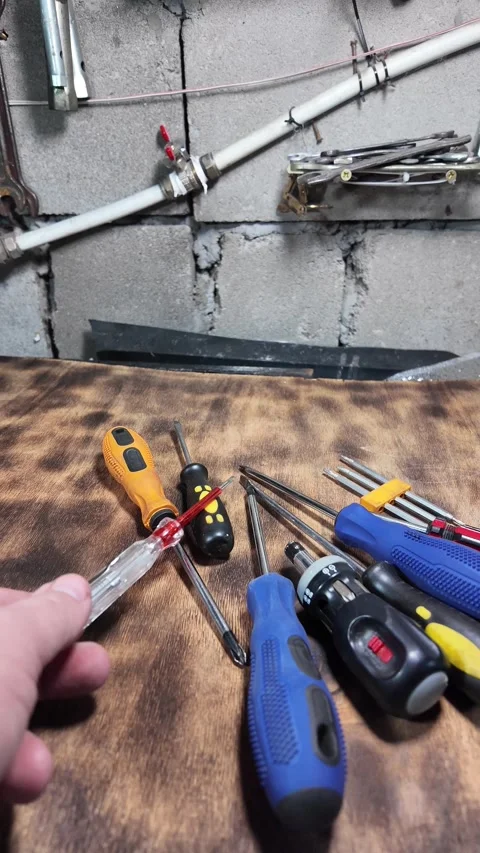 Different screwdrivers on the table. Flat and Phillips screwdrivers. Closeu.. Stock Footage 292384524