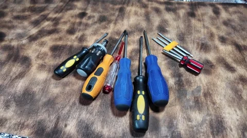 Different screwdrivers on the table. Flat and Phillips screwdrivers. Closeu.. Stock Footage 292385131