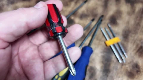 Different screwdrivers on the table. Flat and Phillips screwdrivers. Closeu.. Stock Footage 292385294