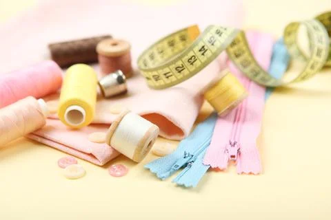 Different sewing accessories on the table. Stock-Fotos