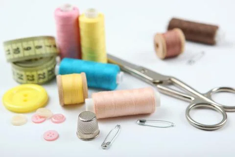 Different sewing accessories on the table. Stock-Fotos