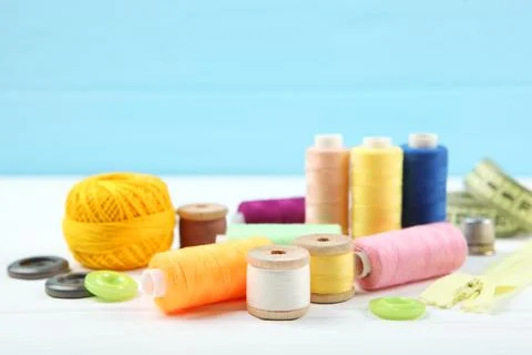 Different sewing accessories on the table. Stock-Fotos