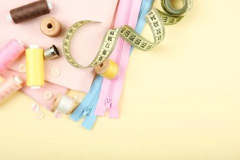 Different sewing accessories on the table. 写真素材