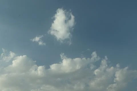 Different shape in blue sky Stock Photos