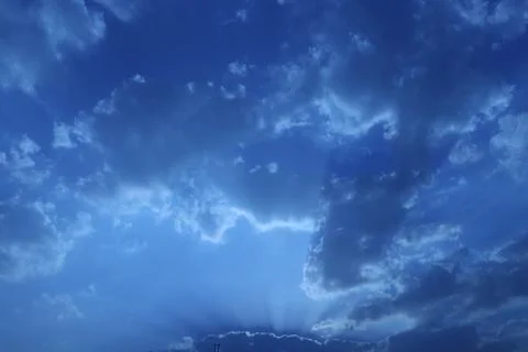 Different shape in blue sky Stock Photos