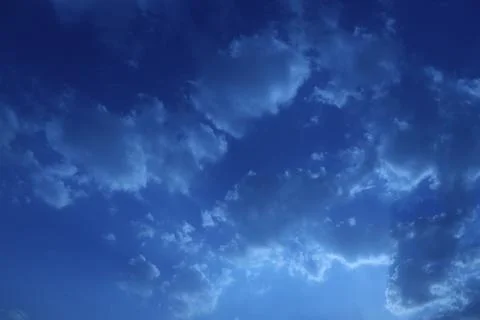 Different shape in blue sky Stock Photos