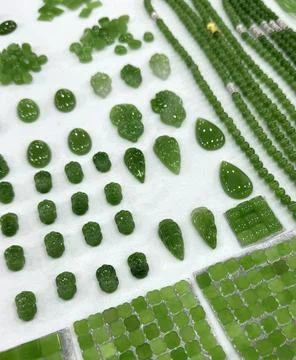 Different shape of green jade on the stall for sale Stock Photos