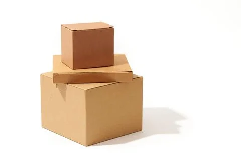 Different shaped cardboard boxes isolated on white background Stock Photos