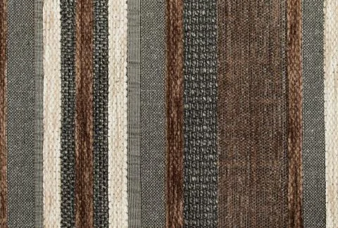 Different shapes and structures of brown, white and black strings in upright Stock Photos