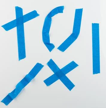 Different shapes made with blue tape on a white background Stock Photos