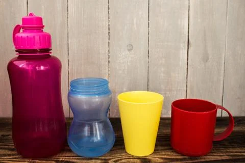 Different size and colors of plastic cups Stock Photos