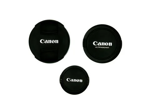 Different size of black lens cap for protection Len on white background. Stock Photos