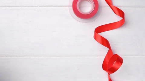 Different size Christmas presents and red ribbon. Stock Footage 121259010