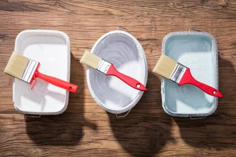 Different Size Of Paint Brush On Container Stock Photos