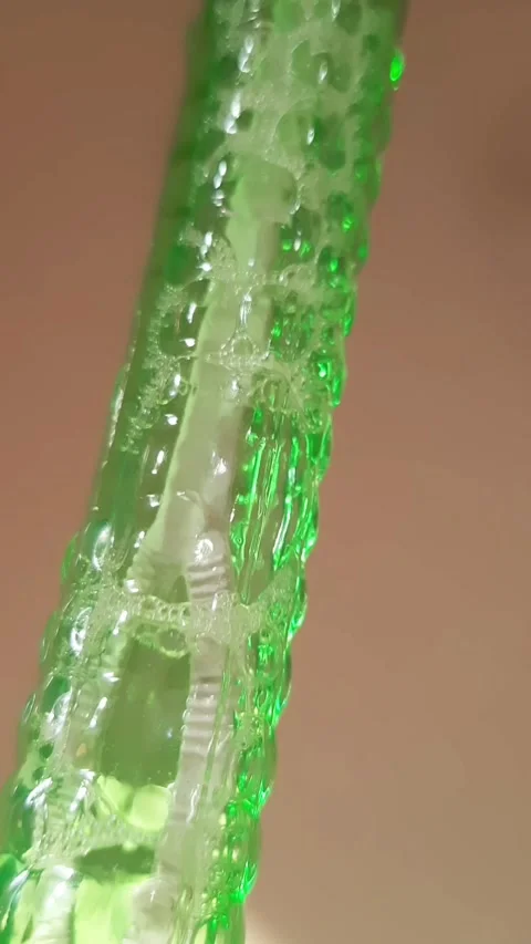 Different Sized Air Bubbles Flowing Through Liquid Stock Footage 343642252