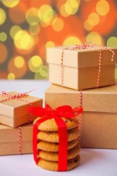 Different sizes Christmas gift boxes, homemade cookies for present on the blu Stock Photos