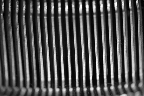 Different small metal elements of an old typewriter Stock Photos