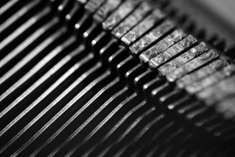 Different small metal elements of an old typewriter Stock Photos