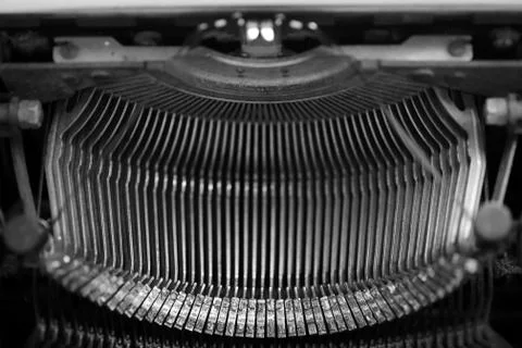 Different small metal elements of an old typewriter Stock Photos