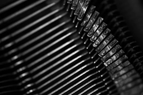 Different small metal elements of an old typewriter Stock Photos