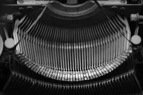 Different small metal elements of an old typewriter Stock Photos