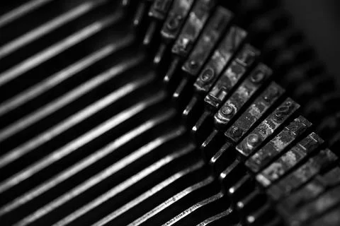 Different small metal elements of an old typewriter Stock Photos