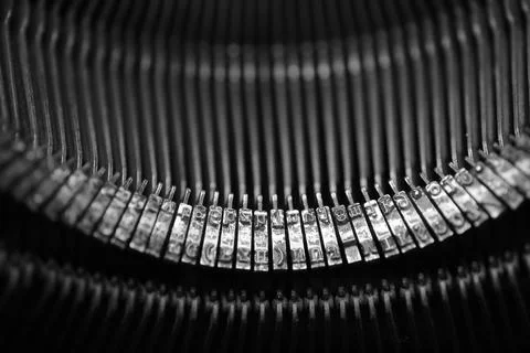 Different small metal elements of an old typewriter Stock Photos