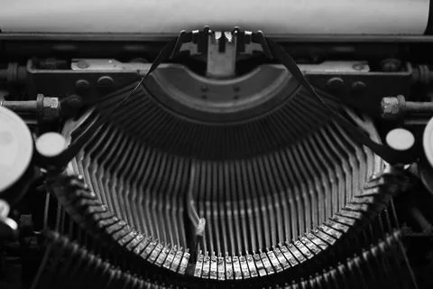 Different small metal elements of an old typewriter Stock Photos