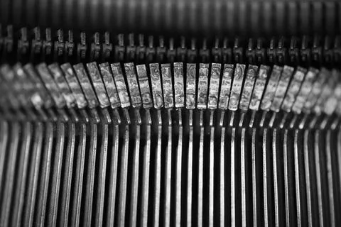 Different small metal elements of an old typewriter Stockfoto's
