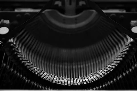 Different small metal elements of an old typewriter Stock Photos